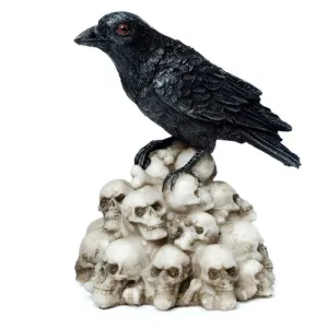 CROW STANDING ON SKULLS